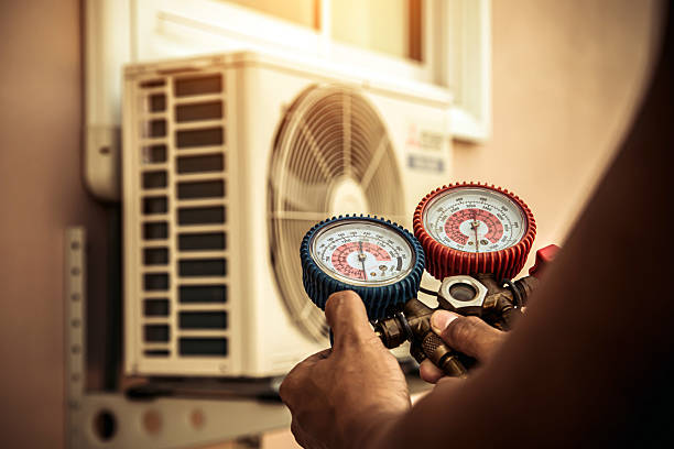 Professional Hvac technician working in Waldron, IN